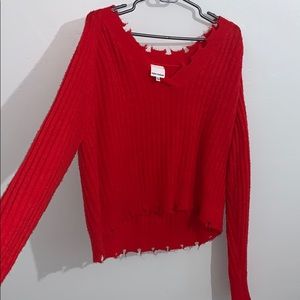 Bright red sweater